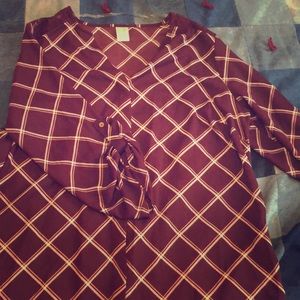 Hidden button down v-neck shirt.